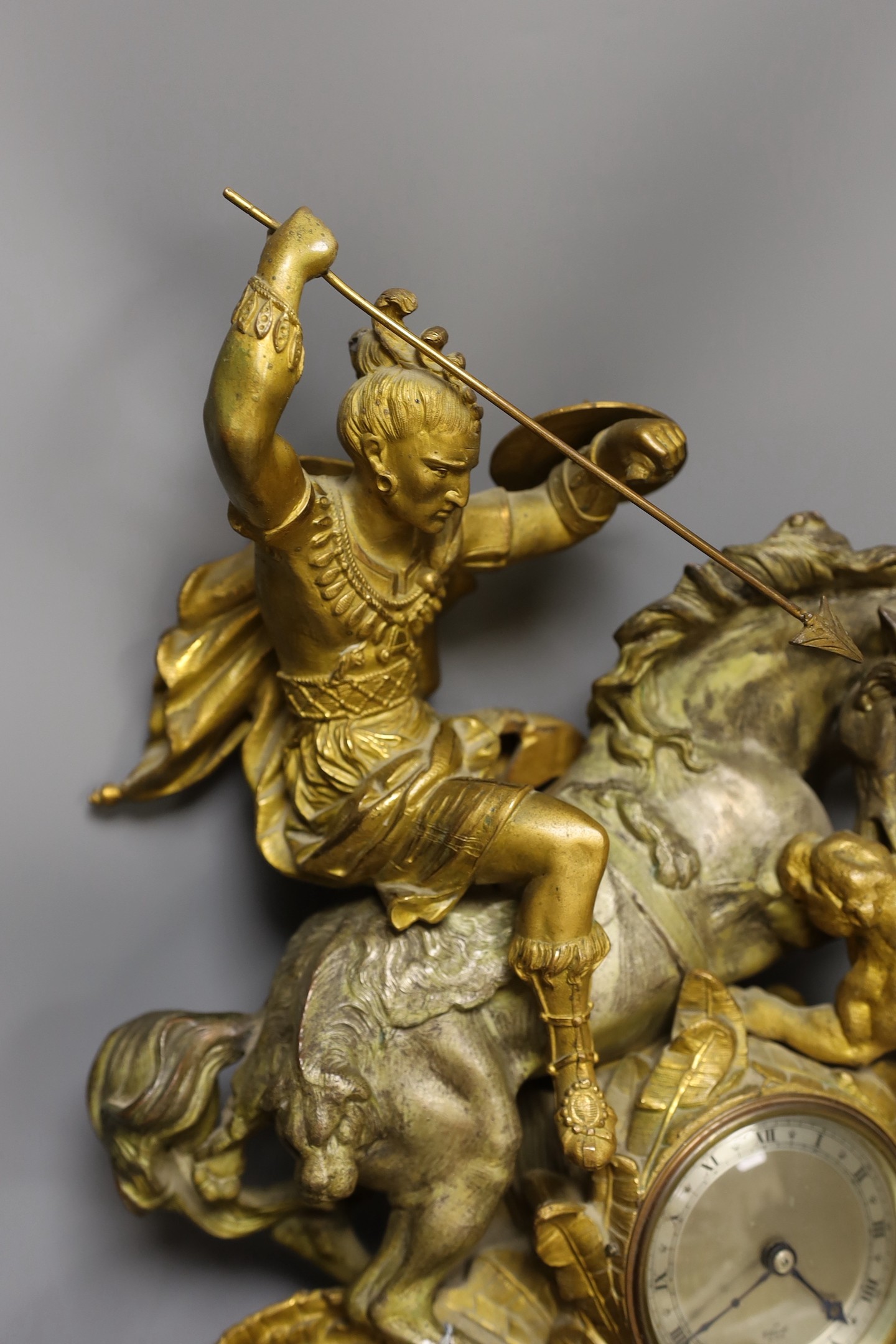 A 19th century spelter mantle clock with later Elliot dial and movement